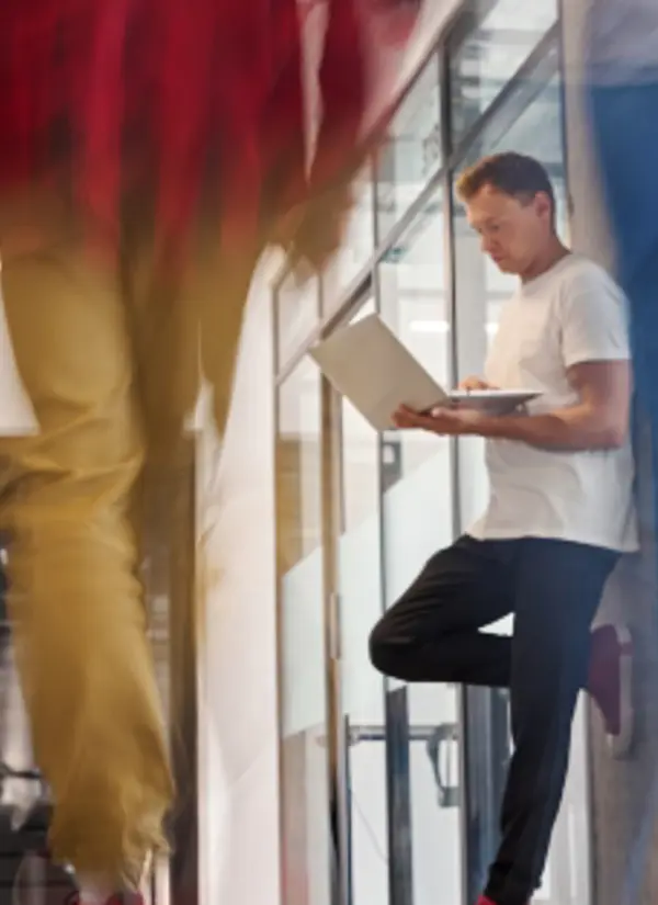 Young Man Working On Project On Laptop In Office B 2024 02 19 22 25 00 Utc